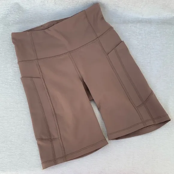 Athleta Brown Ultimate Stash 7” Biker Short